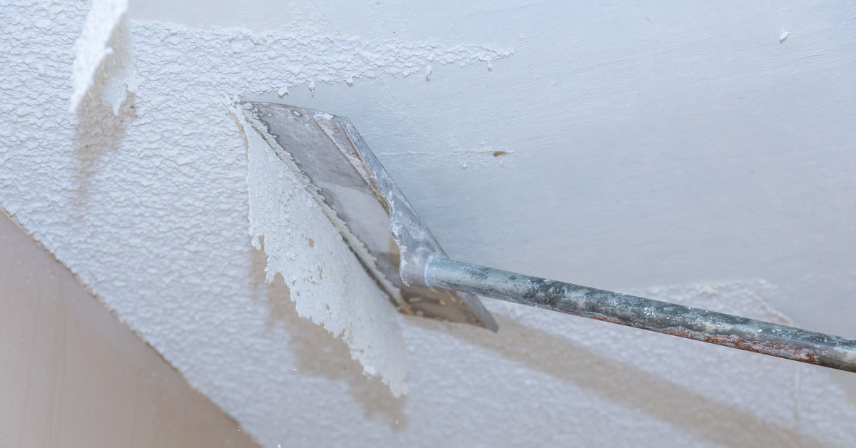 Removing popcorn ceiling layer